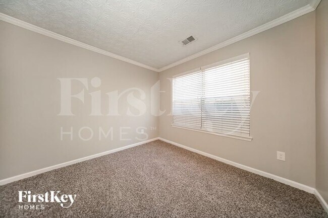 Building Photo - 6496 Snowden Dr