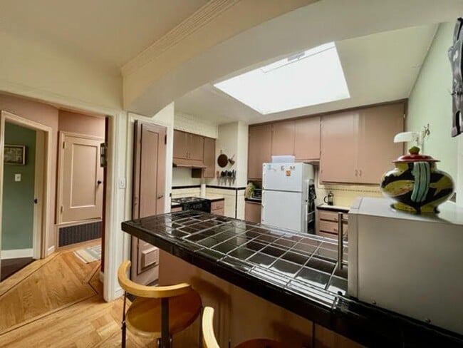 Building Photo - Whimsical 2BR/1BA, Outer Parkside Gem and Dog Friendly! FURNISHED Flexible Lease Term
