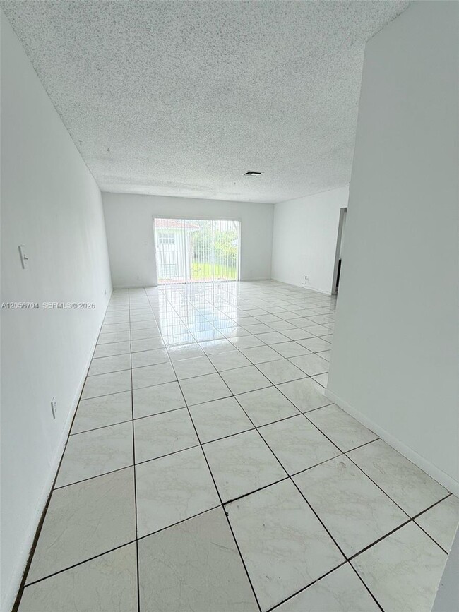 Building Photo - 3100 Coral Springs Dr