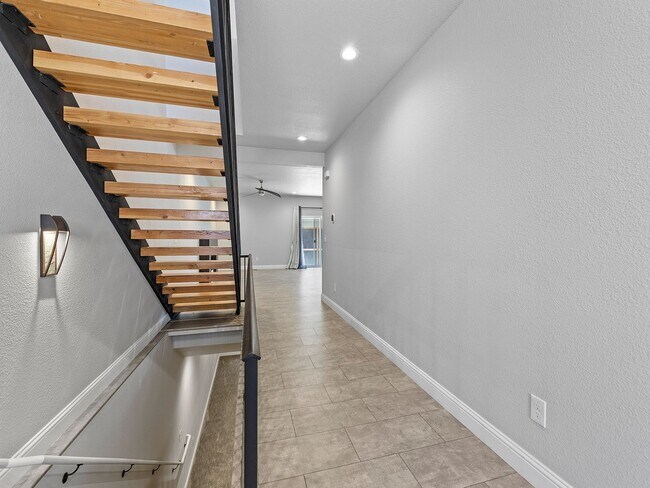 Building Photo - 4-Bedroom Townhome with Finished Basement, Garage & Private Outdoor Space