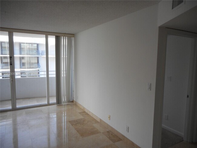 Building Photo - 8911 Collins Ave