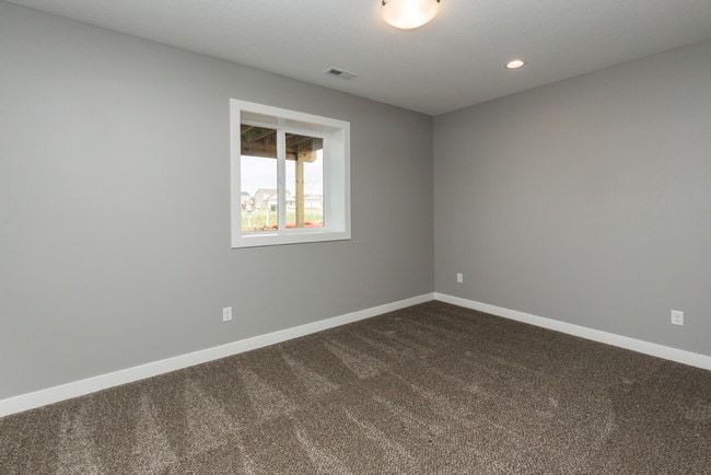 basement bedroom - 615 SE Tallgrass Ln