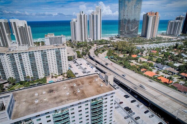 Building Photo - 19380 Collins Ave