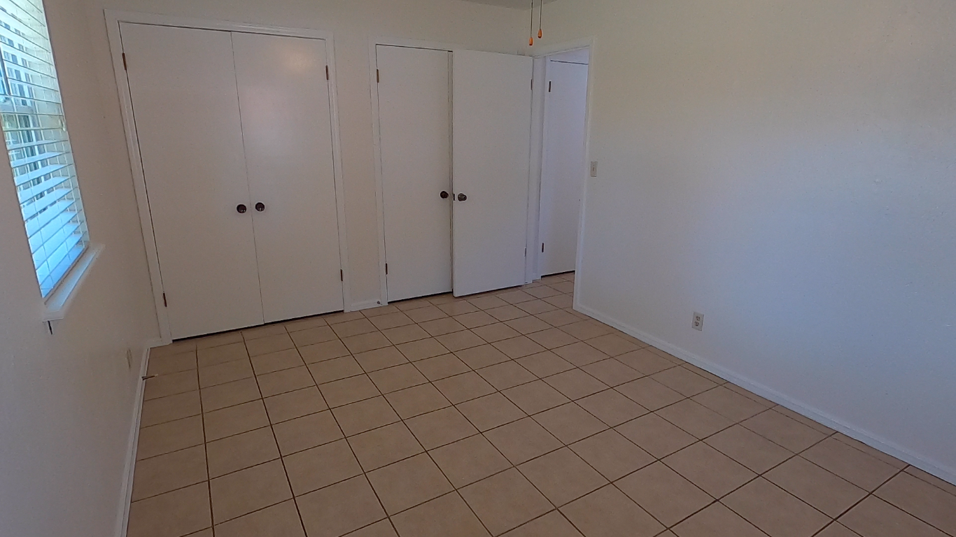 Master bedroom with ceiling fan - 415 W Guthrie St