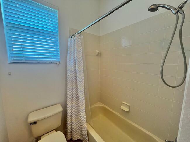 Building Photo - Spacious 4-Bed, 3-Bath Home in Guard-Gated...