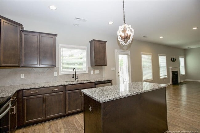 Building Photo - 5709 Pondhaven Dr