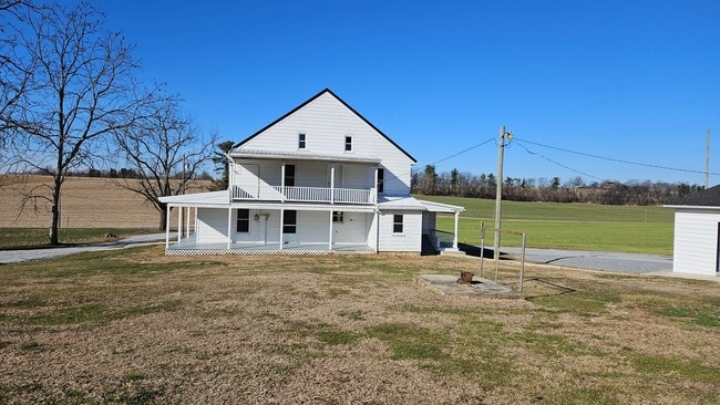 Building Photo - Country Living in This 4 Bedroom Farmhouse!