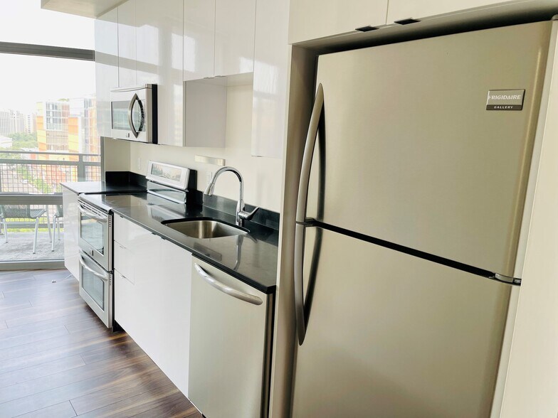 High gloss cabinets and stainless steel applicances - 460 New York Ave NW