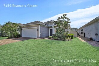 Building Photo - 7459 Rimrock Ct