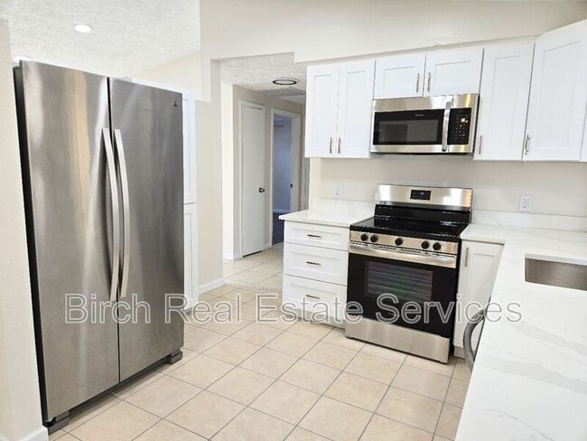 Building Photo - 6448 Reno Ave