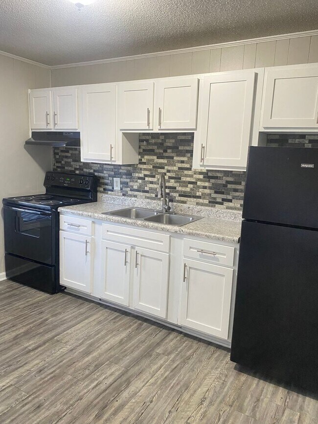 Building Photo - May Savings Are Here! Application Fee WAIVED ALL month!
