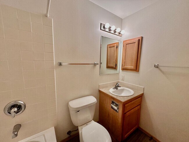 Building Photo - 4 Bedroom 3 Bathroom Home with Attached Garage, AC, and 2 Separate Living Areas!