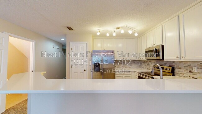 Building Photo - 1002 N Black Cherry Dr