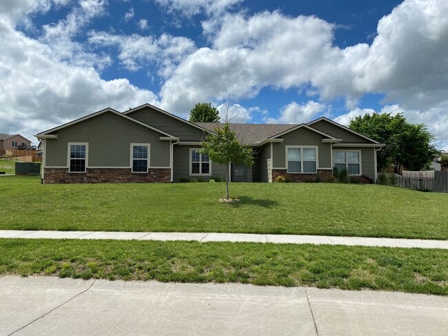 Primary Photo - FENCED BACKYARD! BONUS ROOM/OFFICE! SAFE ROOM! THREE CAR GARAGE