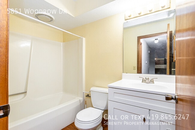 Building Photo - 5851 Woodrow Dr