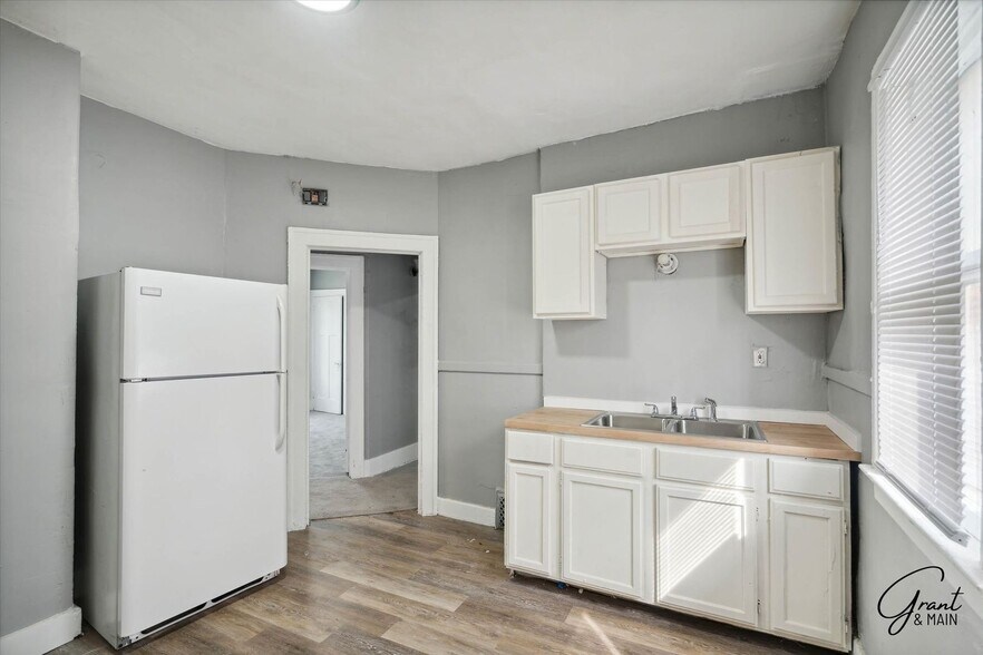 Building Photo - 3813/3815 W Euclid - JL Schneider LLC