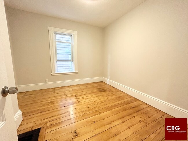 Building Photo - 11-13 Buttonwood St. Unit 1A