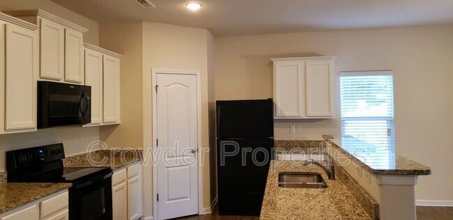 Building Photo - 8119 Paw Club Dr