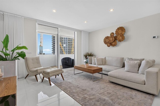 Building Photo - 10275 Collins Ave