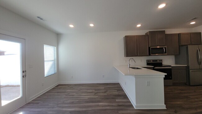 Building Photo - One free month with 18-month lease!!!  "Charming 3-Bed Townhouse Retreat with Granite Elegance in...