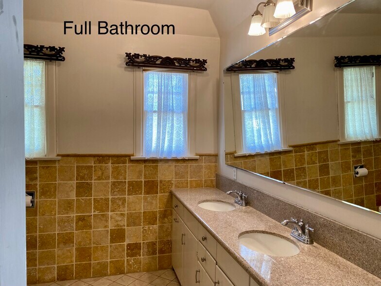 Bathroom with shower and tub - 948 N Howard St