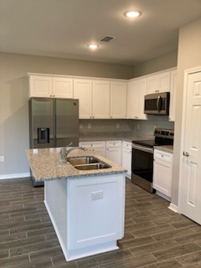 Building Photo - Brand New Build- 3 Bedroom 2.5 bath townhome.