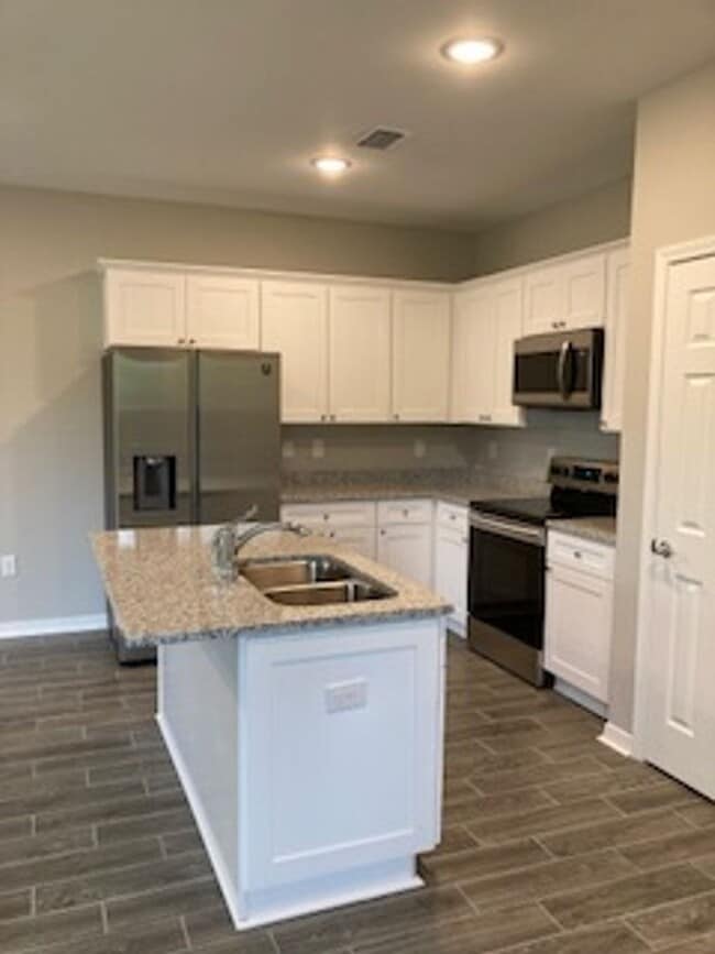 Building Photo - Brand New Built- 3 Bedroom 2.5 bath townhome.