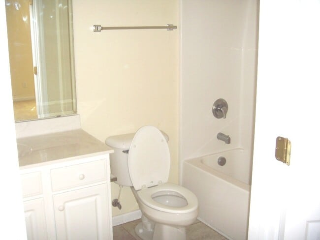 Building Photo - Coming Soon! Students welcome! 3 BR House with rocking chair front Porch. Close to UNCW