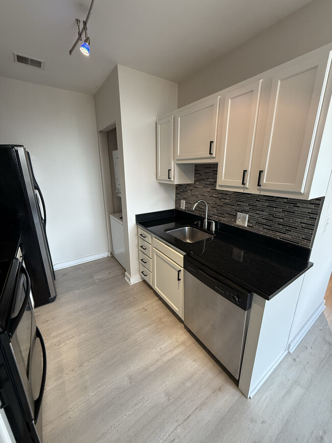 Kitchen with dishwasher - 5885 Colorado Ave NW