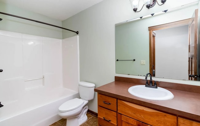 Building Photo - Check out this 4 BR 2 Bath single family h...