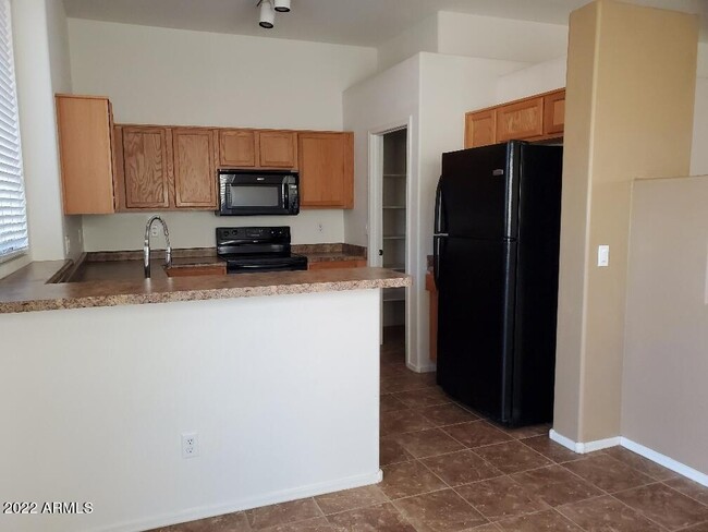 Building Photo - 1176 W Fruit Tree Ln