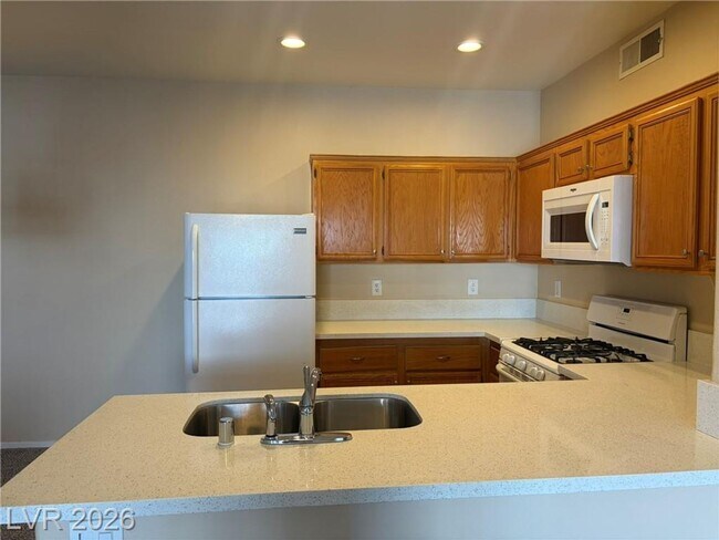 Building Photo - Green Valley 1BR Condo with Quartz Counters, Pool & Covered Parking