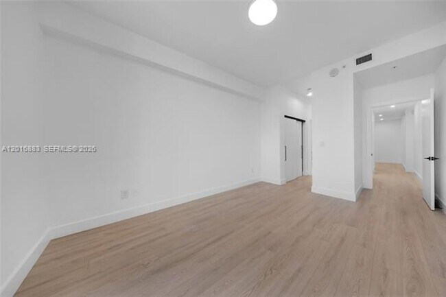 Building Photo - 7901 Hispanola Ave