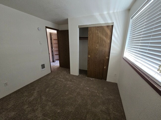Building Photo - READY NOW. Huge backyard, lovely two bedro...