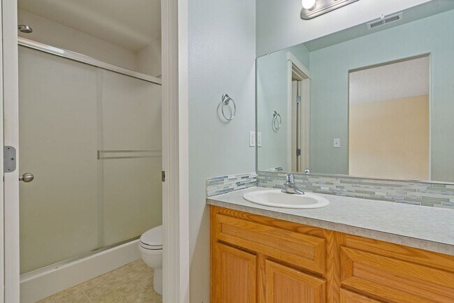 Building Photo - SPACIOUS LAYOUT! HARD SURFACE FLOORING, FE...