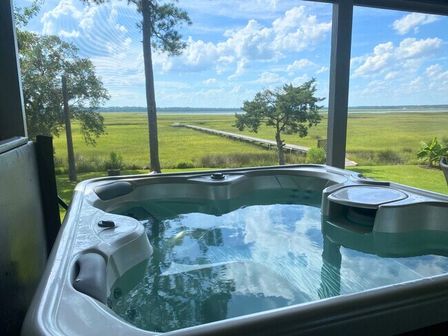 Building Photo - Spacious 4 Bedroom, 2.5 Bath Home with Stunning Marsh Views