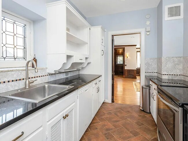Building Photo - Welcome to the Stone House, a charming 3-bedroom, 2-bathroom