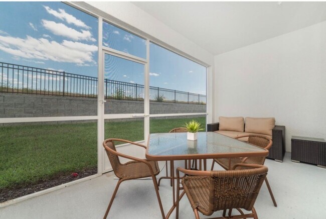 Building Photo - BEAUTIFUL CHAMPIONS GATE 2 BED 2 BATH COND0  w/GARAGE - FULLY FURNISHED - 12 MONTH RENTAL