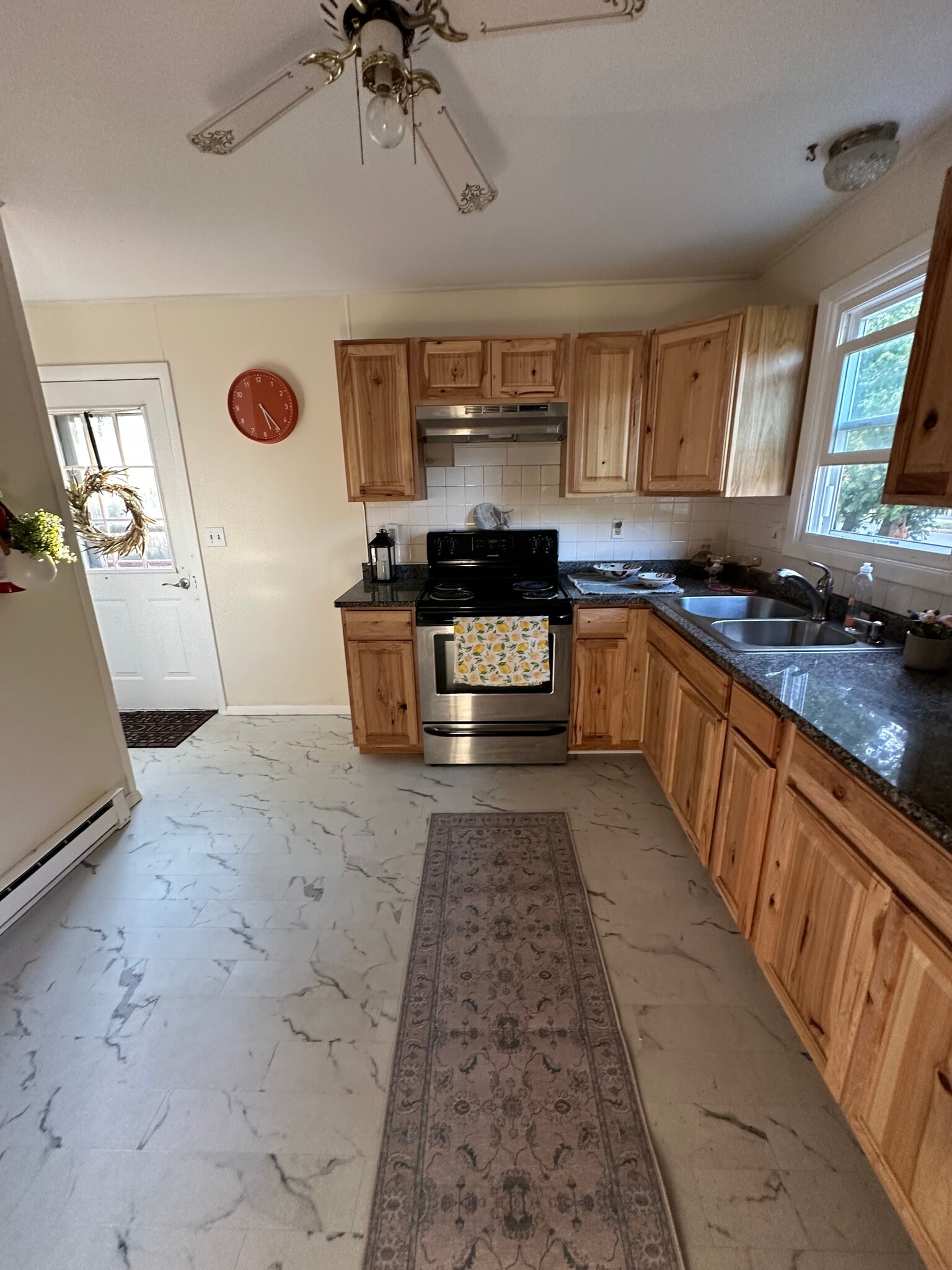 Kitchen with back door - 91 Faith St