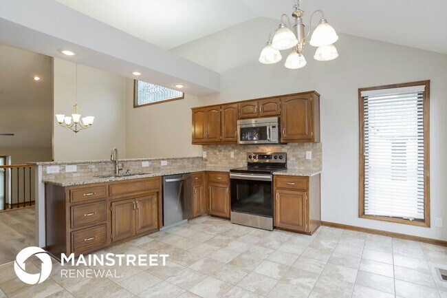 Building Photo - 5203 Woodsonia Dr