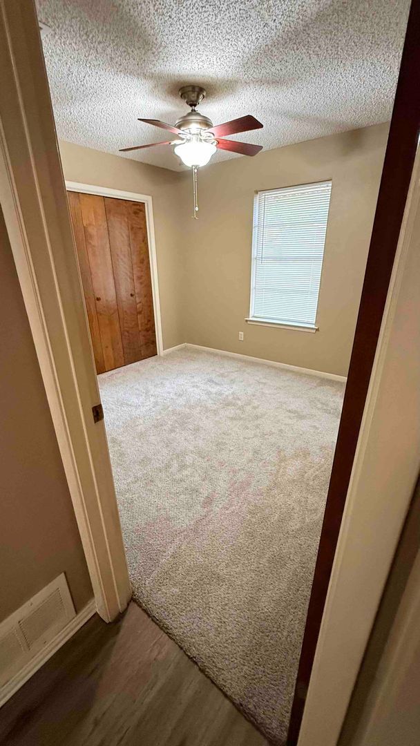 Building Photo - 3 bedroom / 2 bath / 2 car garage - Covered porch with shaded back yard