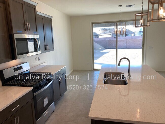 Building Photo - 4 Bed, 3 Bath House + Den + Loft in Gladden Farms * MOVE-IN SPECIAL* (Moore Rd/Tangerine Farms)