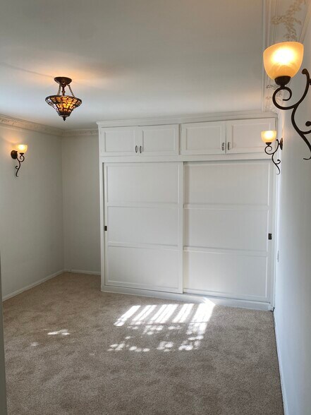 Wonderful bedroom with full size, closet, and storage above. Windowslook out to nature! - 1859 1/2 Pandora Ave