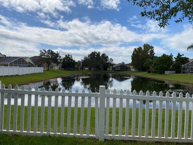 Building Photo - Lakefront 3-Bedroom Pool Home in Gated Com...