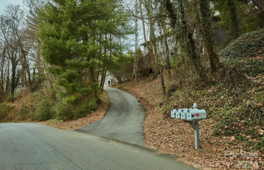 Private property elevated from the road below - 47 Aurora Dr