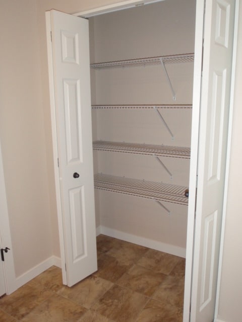 Building Photo - Newer house with attached garage. Half mon...