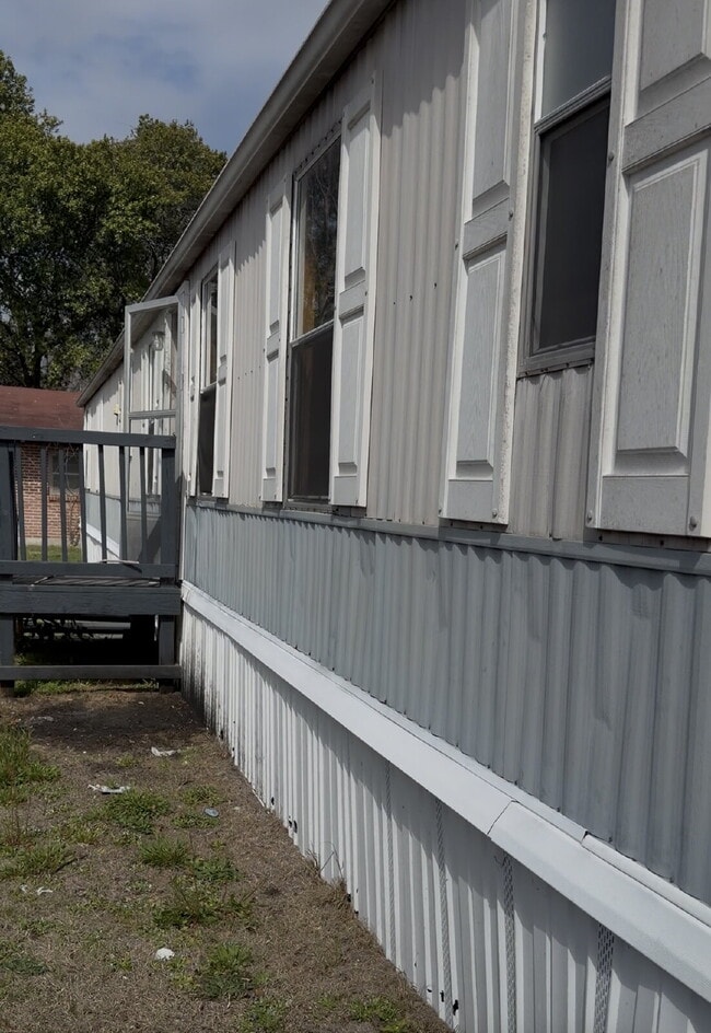 Building Photo - Handyman Special – Land + Home (Rent-to-Own)