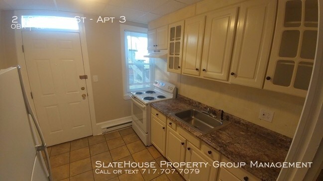 Building Photo - Efficiency Apartment with Off-street Parking