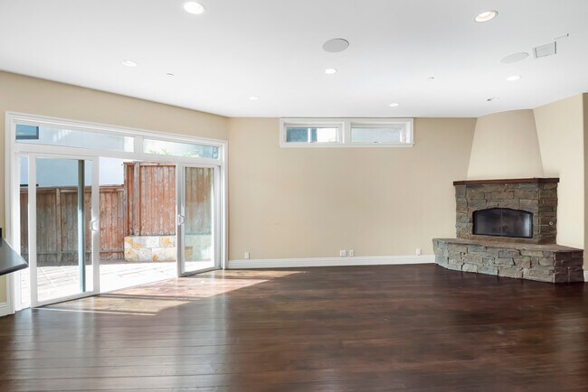 Living Room with Fireplace that opens to backyard - 620 13th St