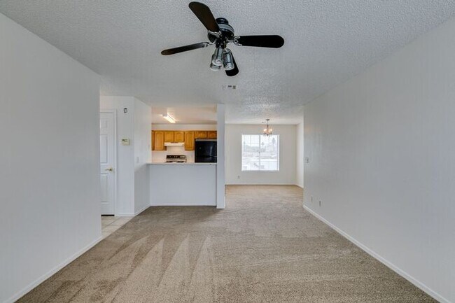 Building Photo - Charming Second-Floor Condo with Two Bedrooms and Fireplace